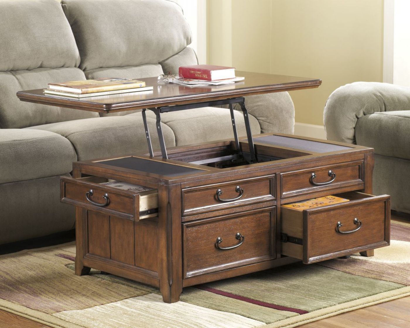 Room View with Open Lift-Top and Drawers on the 4 Drawer Brown Woodboro Lift-Top Coffee Table by Ashley Furniture | Home Furniture Plus Bedding