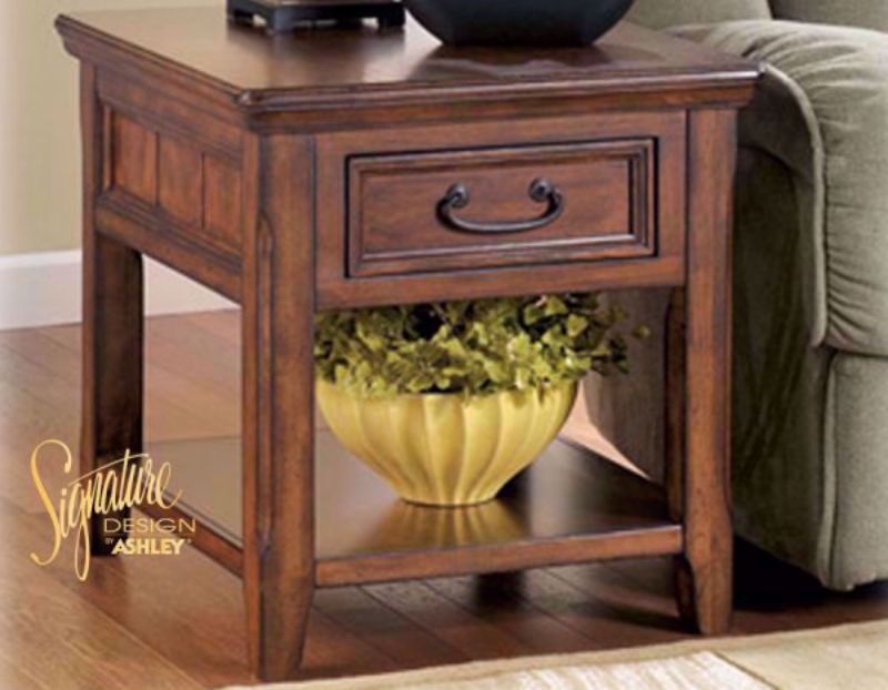 Brown Woodboro Rectangular End Table by Ashley Furniture in a Room Setting | Home Furniture Plus Bedding