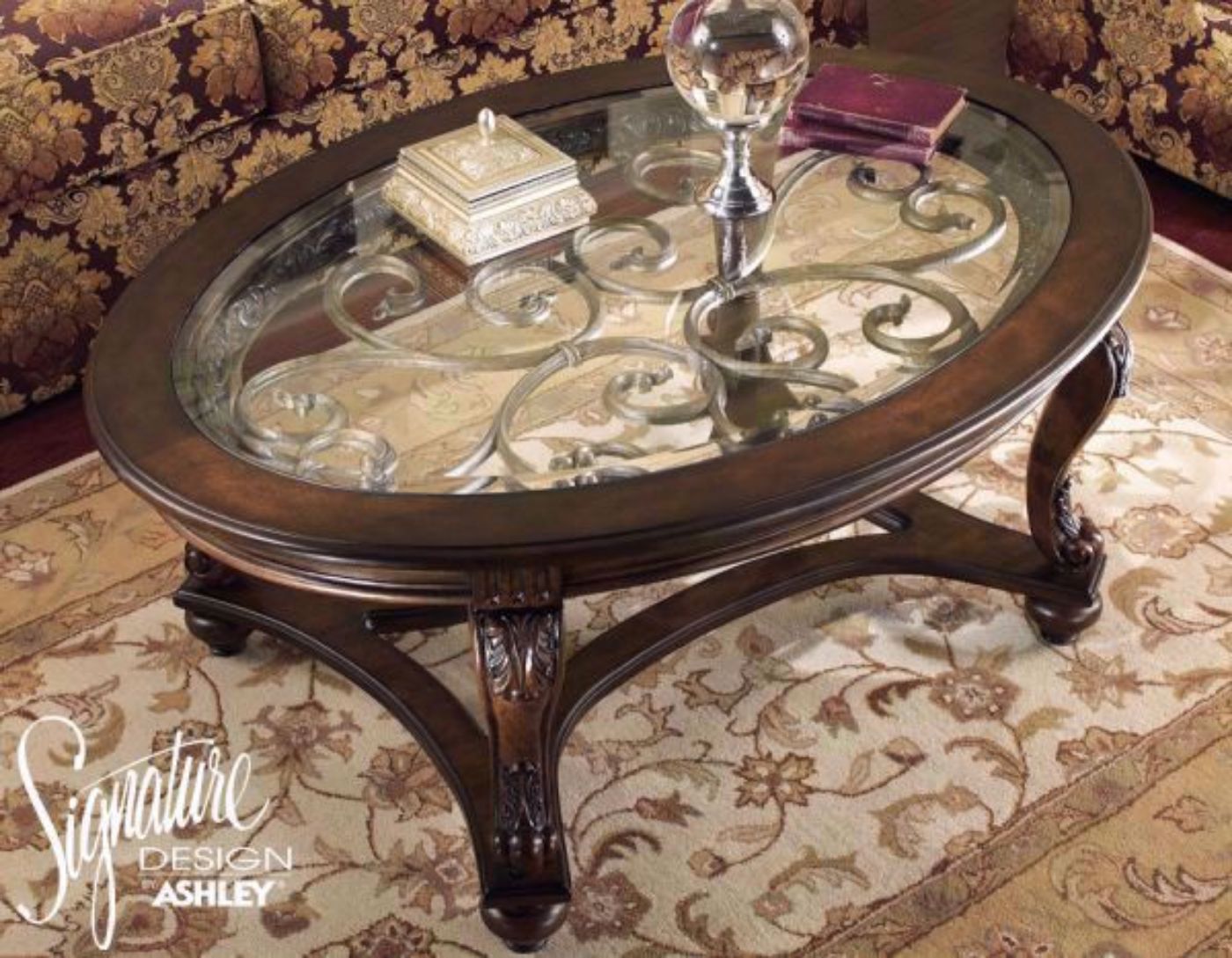 View of Glass Table Top and Table Base of the Norcastle Coffee Table by Ashley Furniture | Home Furniture Plus Mattress
