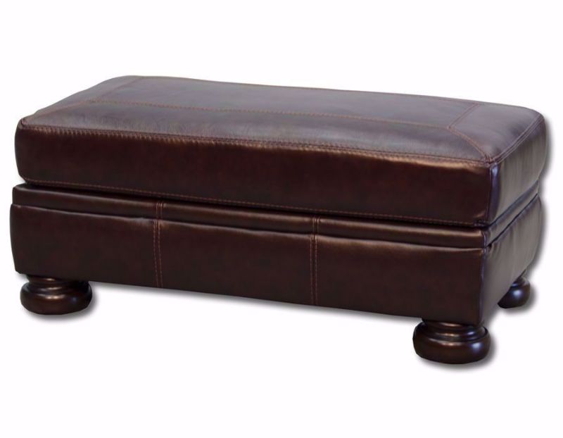Slightly Angled View of the Banner Ottoman by Ashley Furniture with Brown Top Grain Leather Upholstery | Home Furniture Plus Bedding