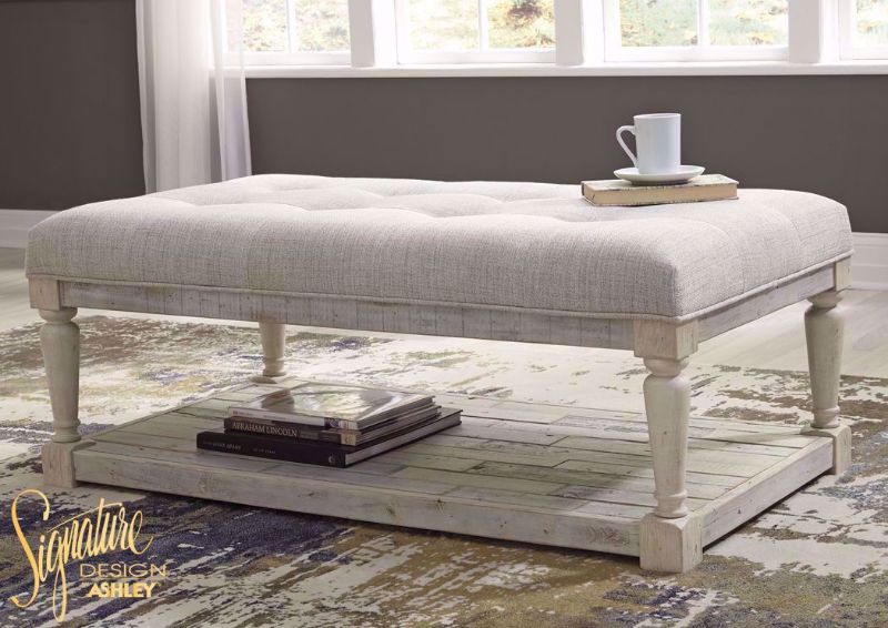 White Shawnalore Upholstered Top Coffee Table in Room Setting | Home Furniture Plus Bedding