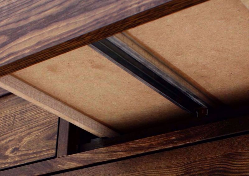 Dark Brown Cheyenne Dresser with Mirror Showing the Bottom Metal Drawer Glides | Home Furniture Plus Mattress