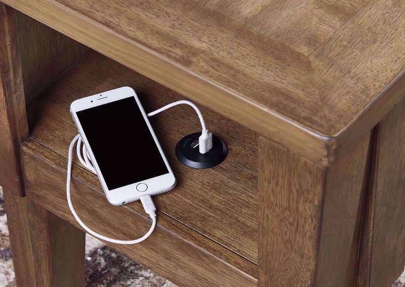Close Up of USB Charging Port on the Light Brown Rowenbeck Chairside End Table by Ashley Furniture | Home Furniture Plus Bedding