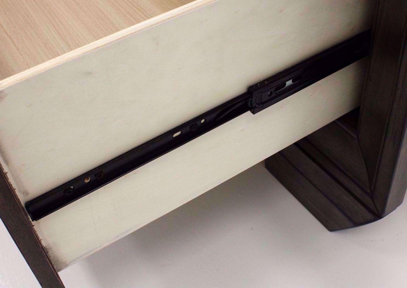 Brown Jaymes King Bed Showing the Footboard Metal Drawer Glides | Home Furniture Plus Bedding