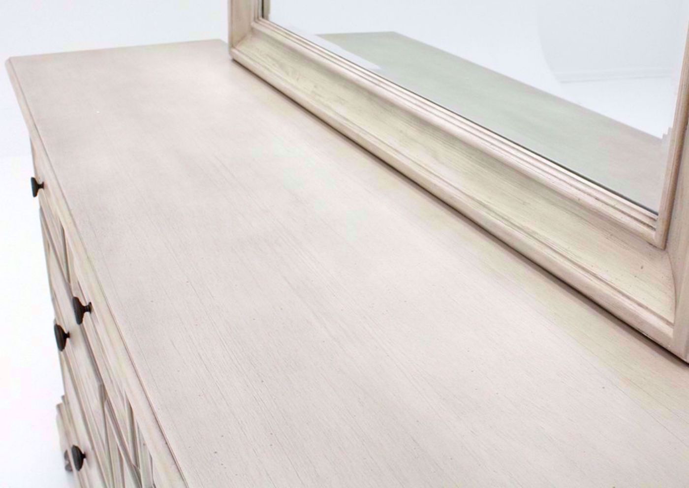 Distressed White Passages Dresser with Mirror Showing the Dresser Top Detail | Home Furniture Plus Bedding