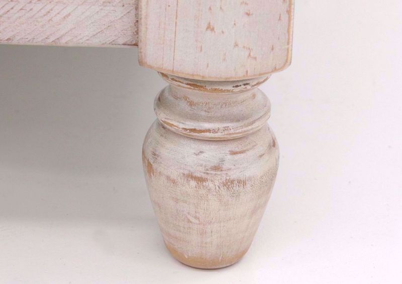 Close Up of Feet on the Shawnalore End Table by Ashley Furniture | Home Furniture Plus Bedding
