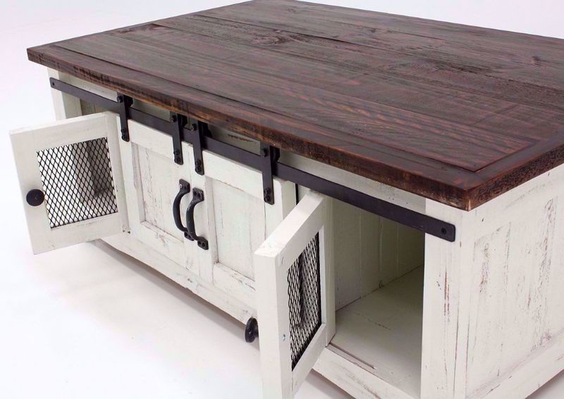 White and Brown Pueblo Coffee Table at an Angle With the Cabinet Doors Open | Home Furniture Plus Bedding