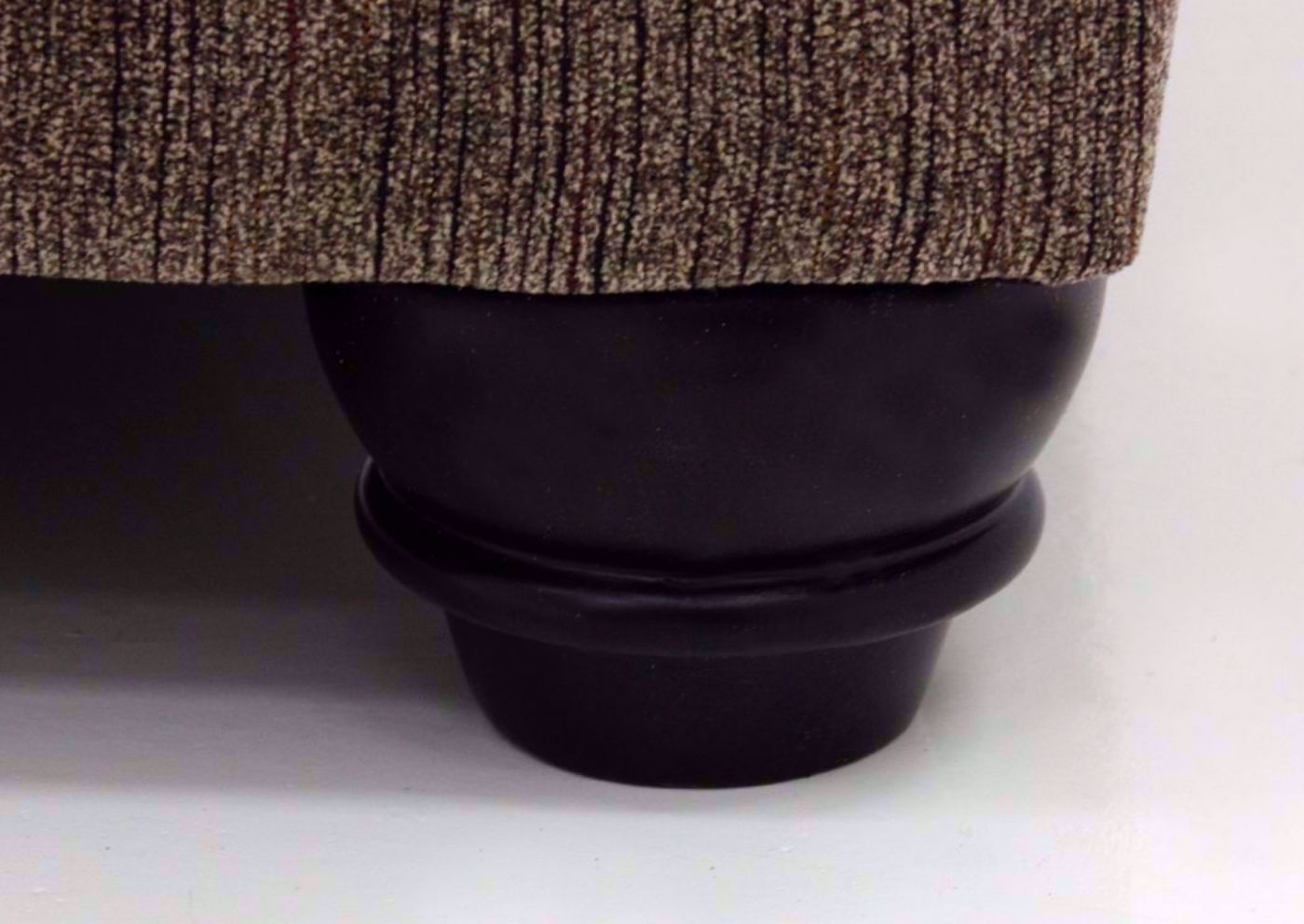 Brown Braemer Sleeper Sofa by Ashley Furniture Close Up of Chair Feet | Home Furniture + Mattress