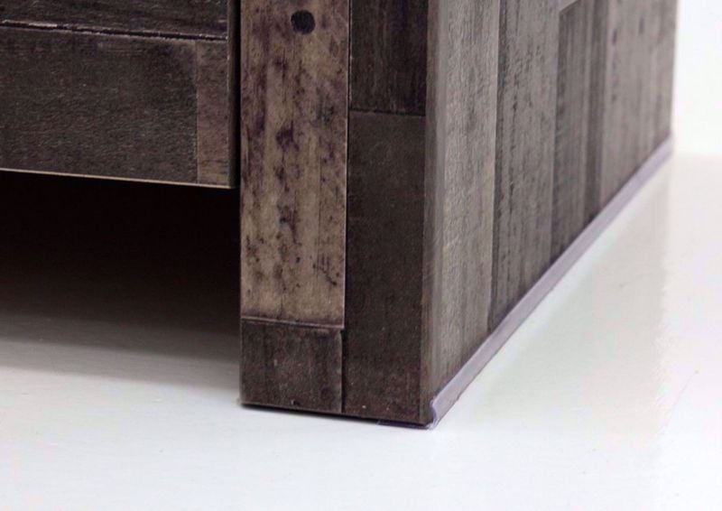 Close Up of Bottom Corner of Rustic Gray Brown Derekson Chest of Drawers by Ashley Furniture | Home Furniture Plus Bedding