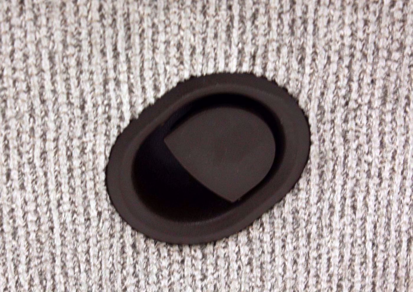 Close Up of the Recliner Tab on the Donnelly Rocking Reclining Loveseat – Tan with Recliner Open | Home Furniture Plus Bedding