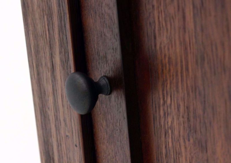Close Up of the Door Hardware on the Budmore End Table by Ashley Furniture | Home Furniture Plus Bedding