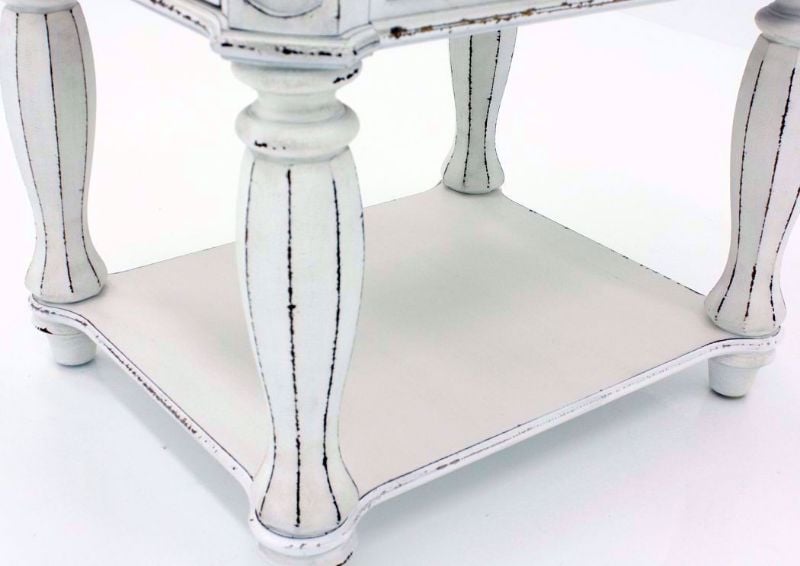 Distressed White Magnolia Manor End Table Showing the Bottom Shelf Detail | Home Furniture Plus Mattress