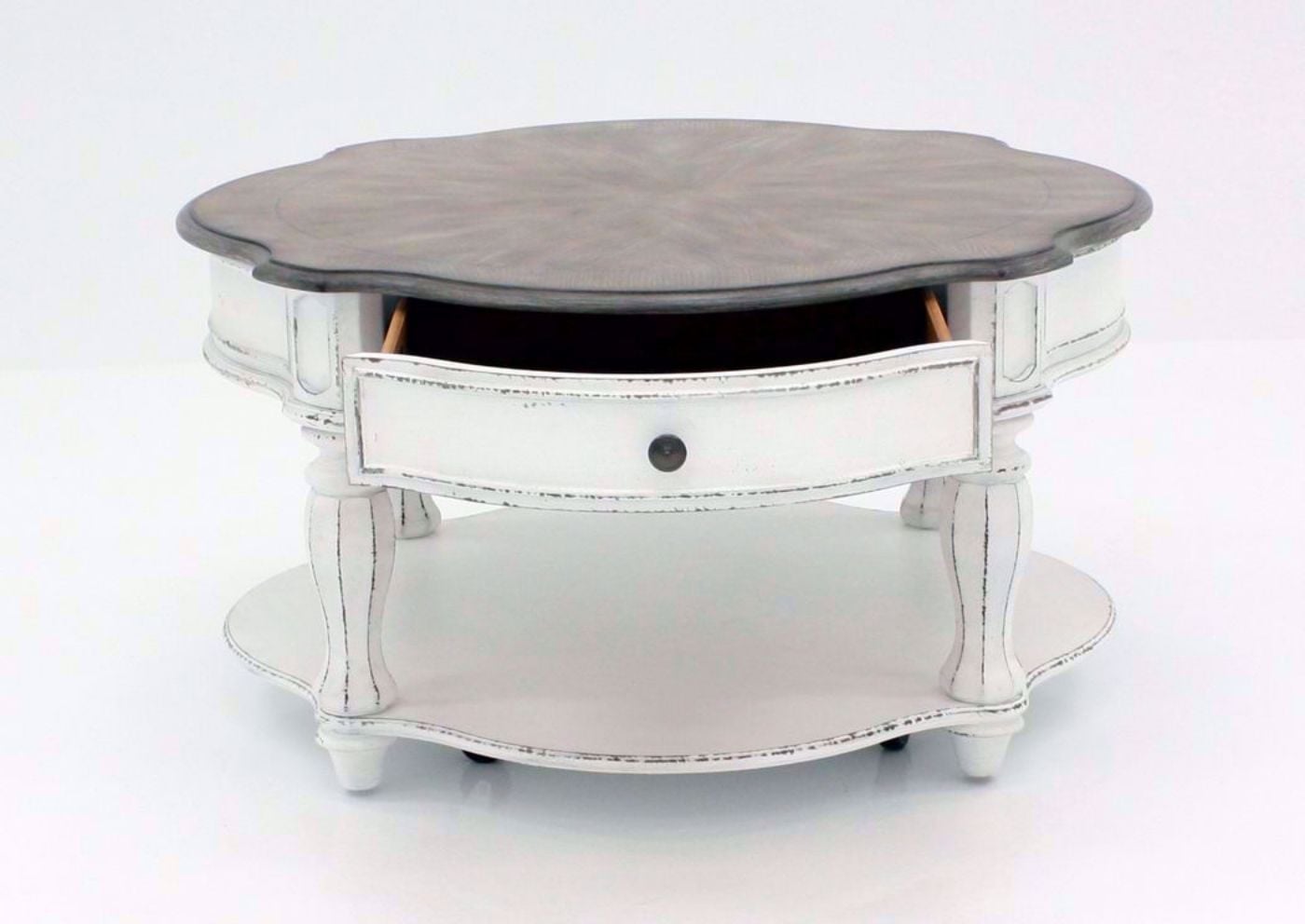 Distressed White Magnolia Manor Round Coffee Table, Front Facing With the Drawer Open | Home Furniture Plus Bedding