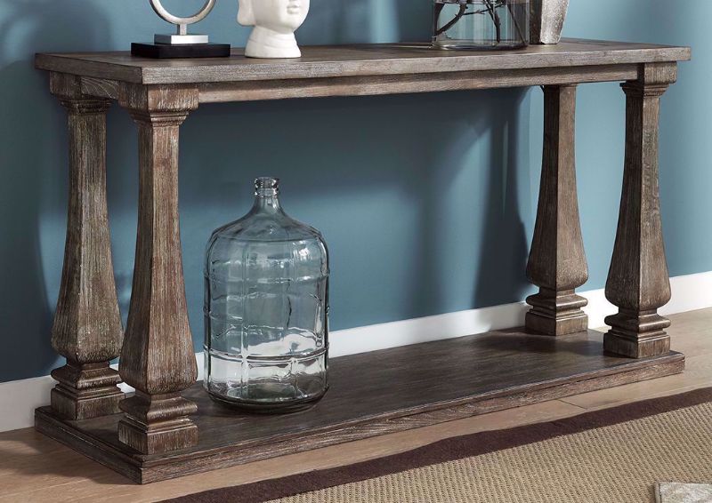 Johnelle Console/Sofa Table by Ashley Furniture In Room Setting with a Weathered Gray and Brown Finish | Home Furniture Plus Mattress