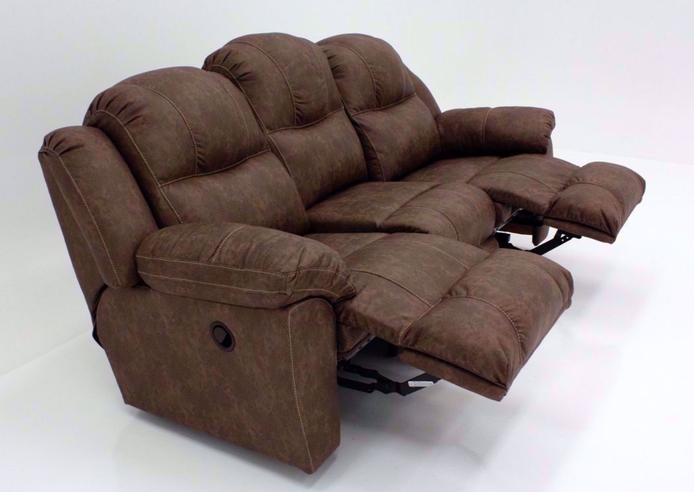 Brown Victory Reclining Sofa at an Angle in the Reclined Position | Home Furniture Plus Mattress