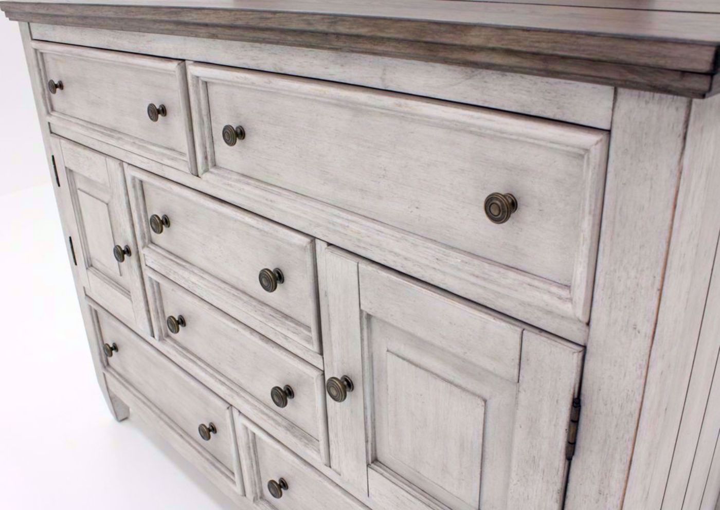 Rustic White Heartland Chesser with Mirror at an Angle Showing the Drawer Fronts | Home Furniture Plus Bedding