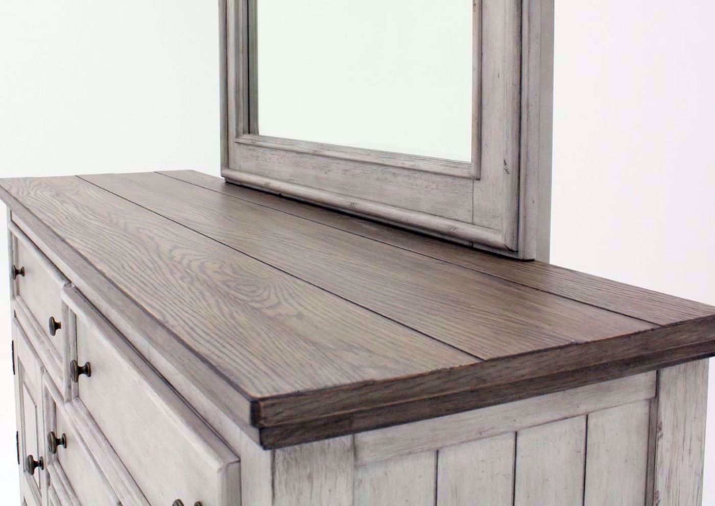 Rustic White Heartland Chesser with Mirror Showing the Brown Dresser Top | Home Furniture Plus Bedding