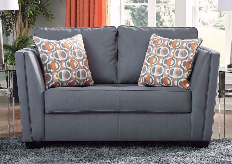 Steel Gray Filone Loveseat by Ashley Furniture with Accent Pillows In Room Setting | Home Furniture + Mattress