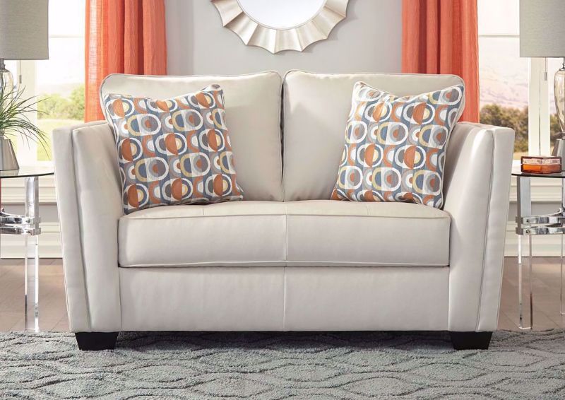 Ivory Filone Loveseat by Ashley Furniture with Accent Pillows In Room Setting | Home Furniture Plus Mattress