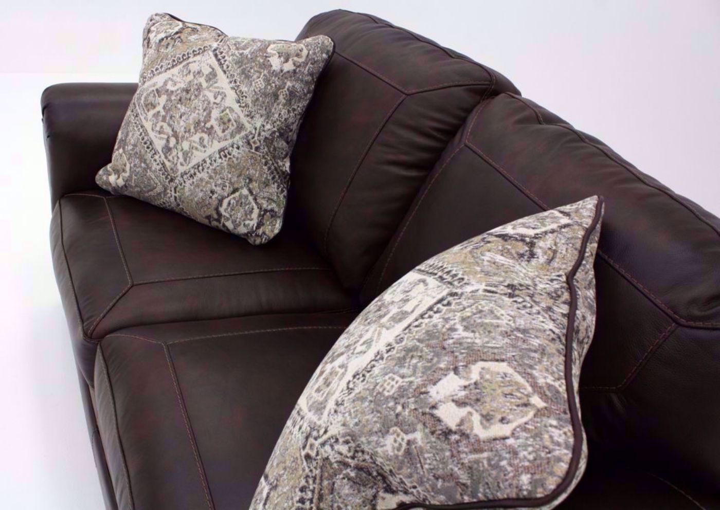 Walnut Brown Roleson Loveseat by Ashley at an Angle | Home Furniture Plus Bedding