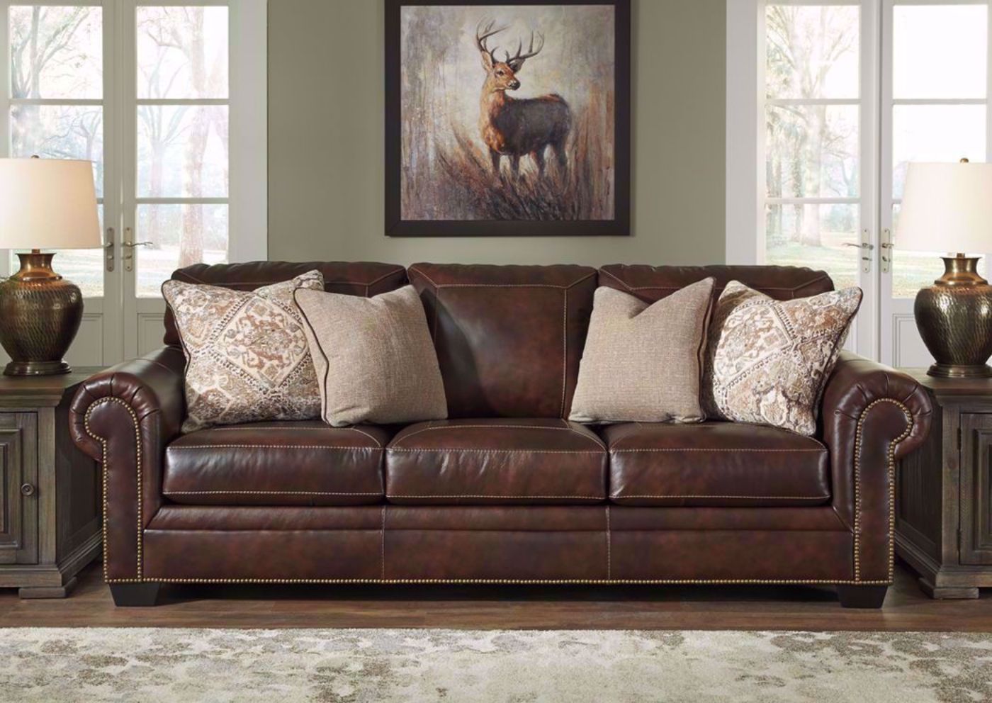 Walnut Brown Roleson Sofa by Ashley Furniture in a Room Setting | Home Furniture Plus Bedding