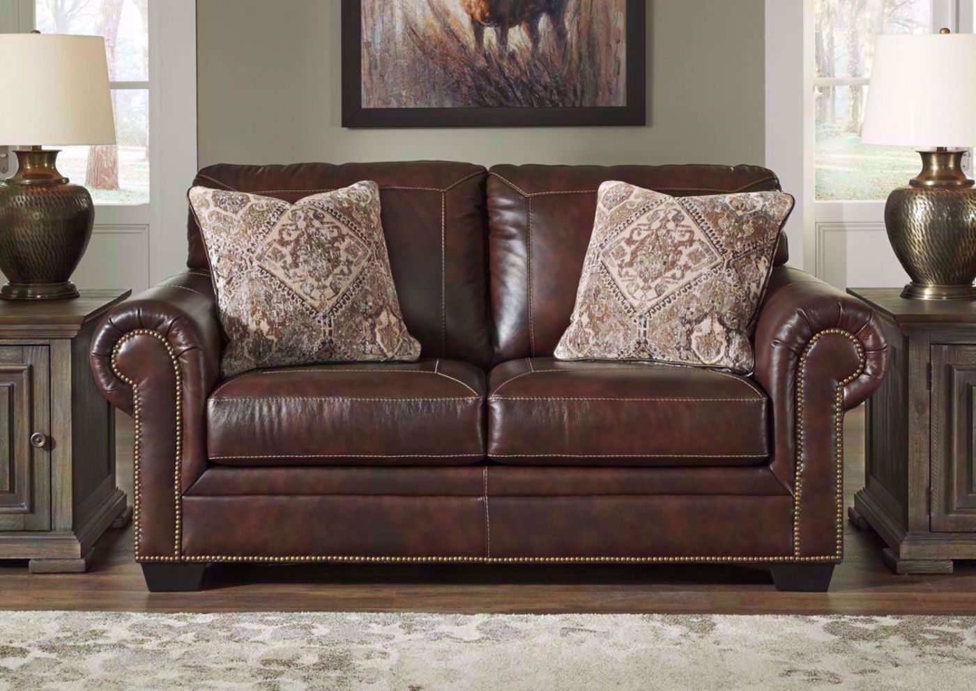 Walnut Brown Roleson Loveseat by Ashley in a Room Setting | Home Furniture Plus Bedding