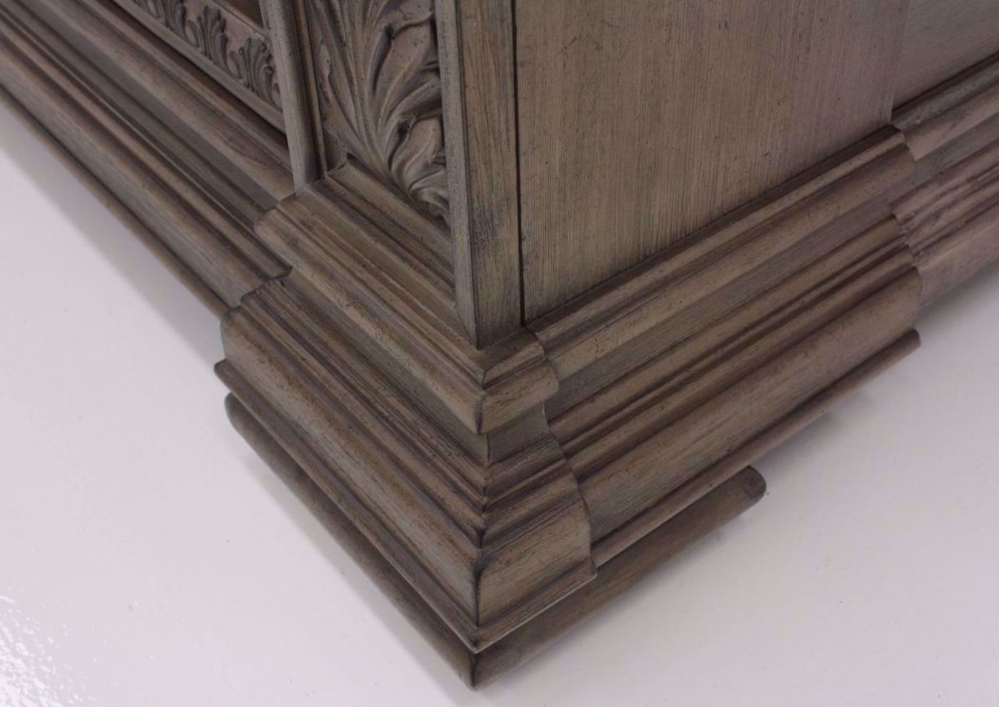 Taupe Brown Maria Queen Size Storage Bed Showing the Bracket Foot Detail | Home Furniture Plus Bedding, Angle