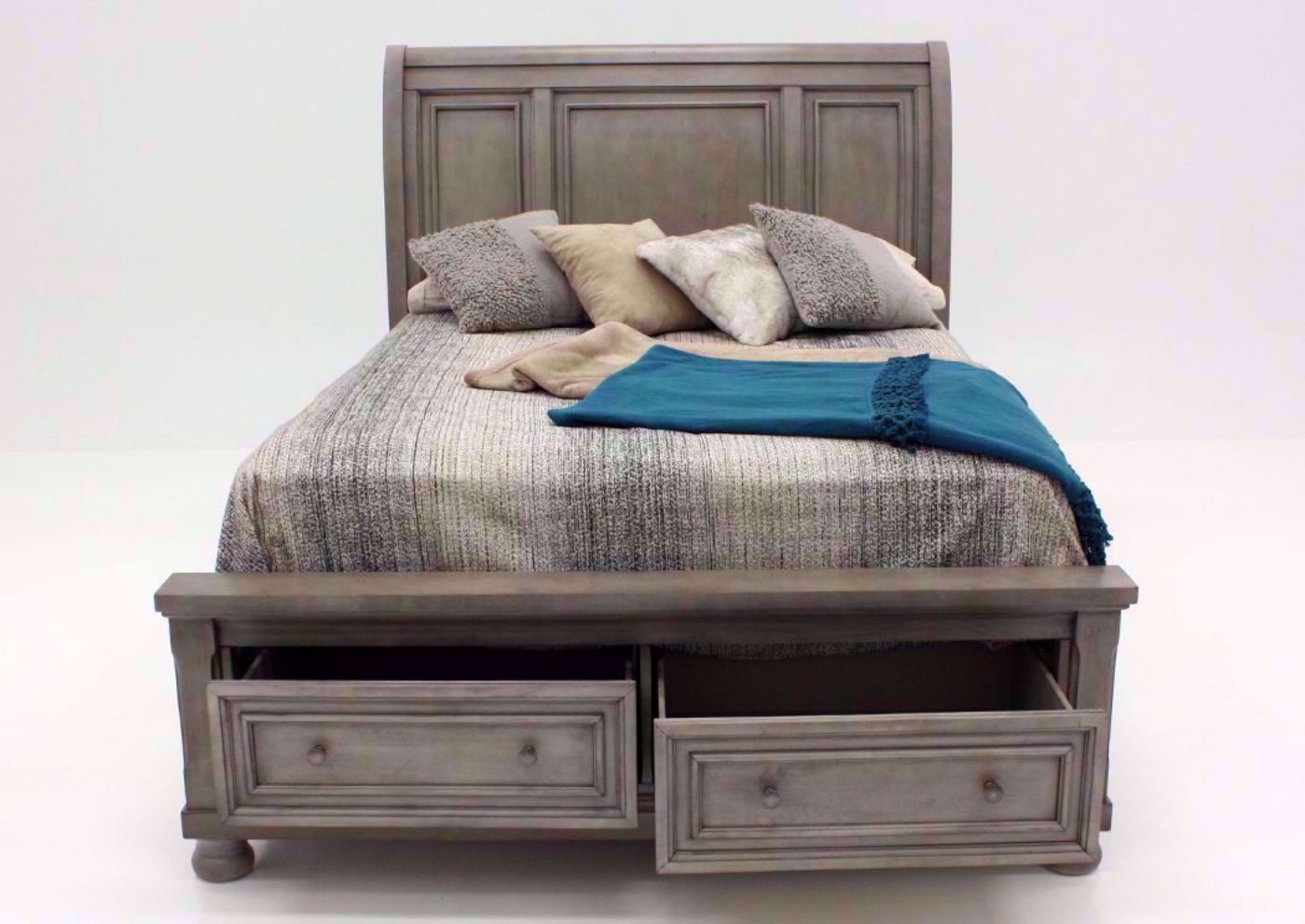 Light Gray Lettner Queen Size Sleigh Bed by Ashley Furniture Facing Front with the Footboard Drawers Open | Home Furniture Plus Bedding