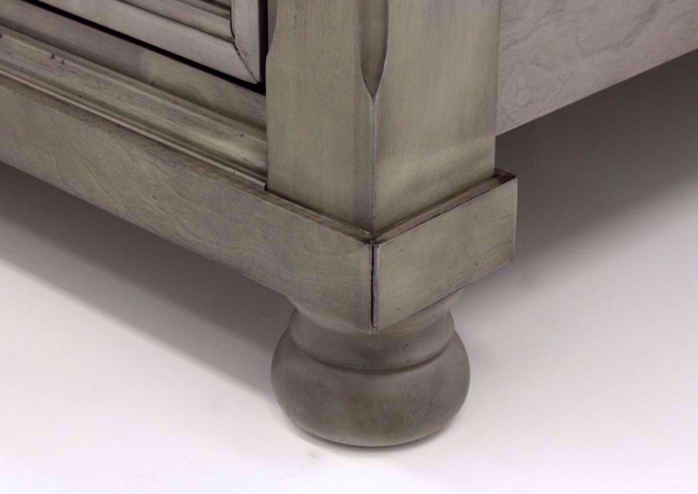 Light Gray Lettner Queen Size Sleigh Bed by Ashley Furniture Showing the Turned Foot | Home Furniture Plus Bedding