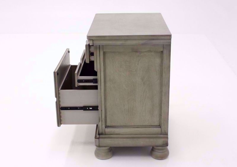 Light Gray Lettner Nightstand by Ashley Furniture Showing the Side View With the Drawers Open | Home Furniture Plus Mattress