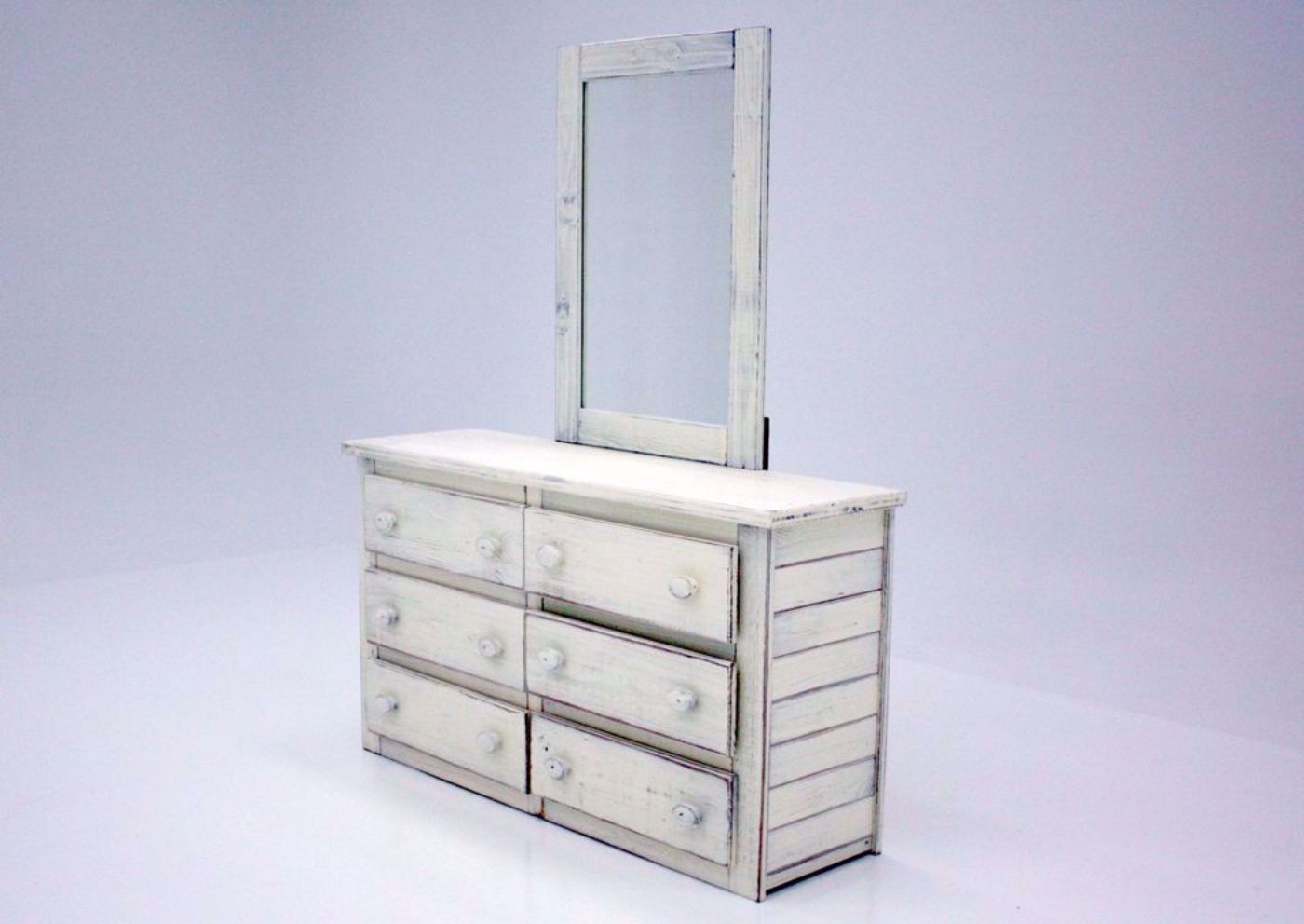 Distressed White Duncan Dresser with Mirror at an Angle | Home Furniture Plus Mattress