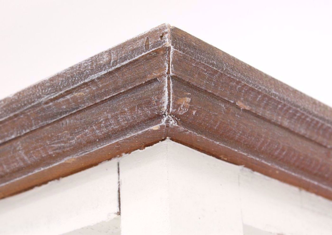 Antique White and Ash Brown Vintage Bookcase Showing the Top Frame of the Bookcase | Home Furniture Plus Bedding