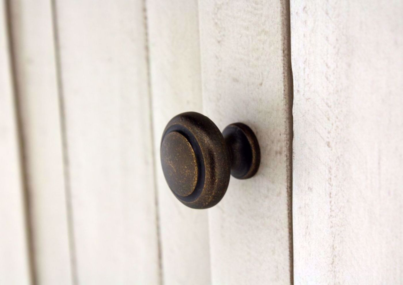 Distressed White Two-Tone Madison County Dining Table Set Showing the Table Showing Metal Door Knob | Home Furniture Plus Mattress