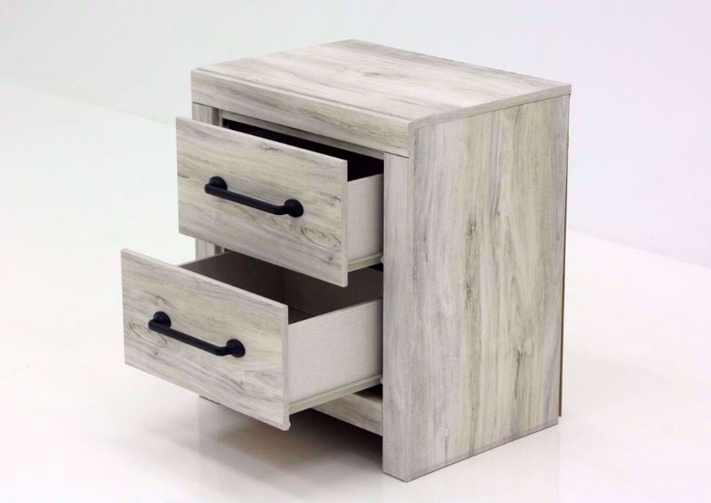 Rustic White Cambeck Nightstand by Ashley Furniture at an Angle with the Drawers Open | Home Furniture Plus Mattress