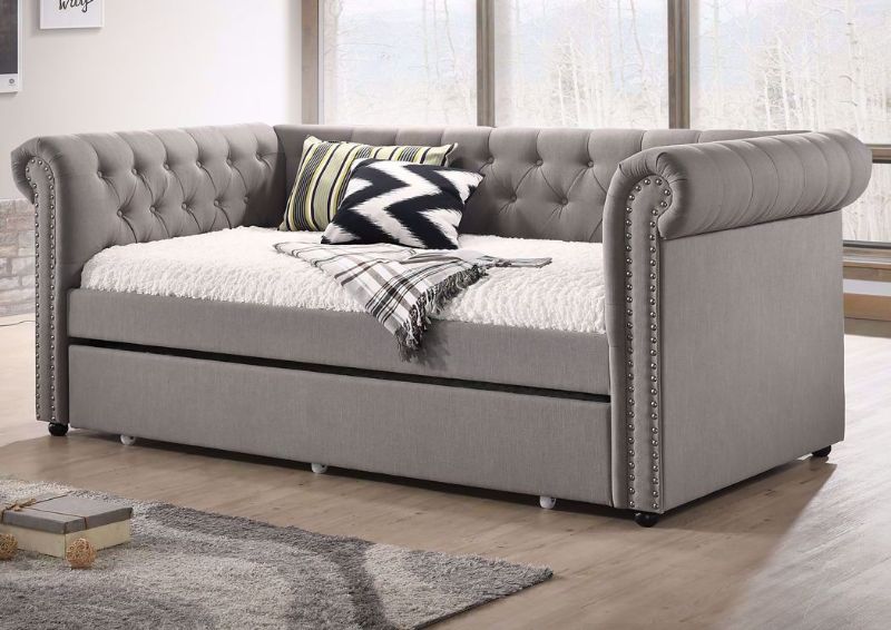 Gray Upholstered Ellie Daybed with the Trundle Closed in a Room Setting | Home Furniture Plus Mattress