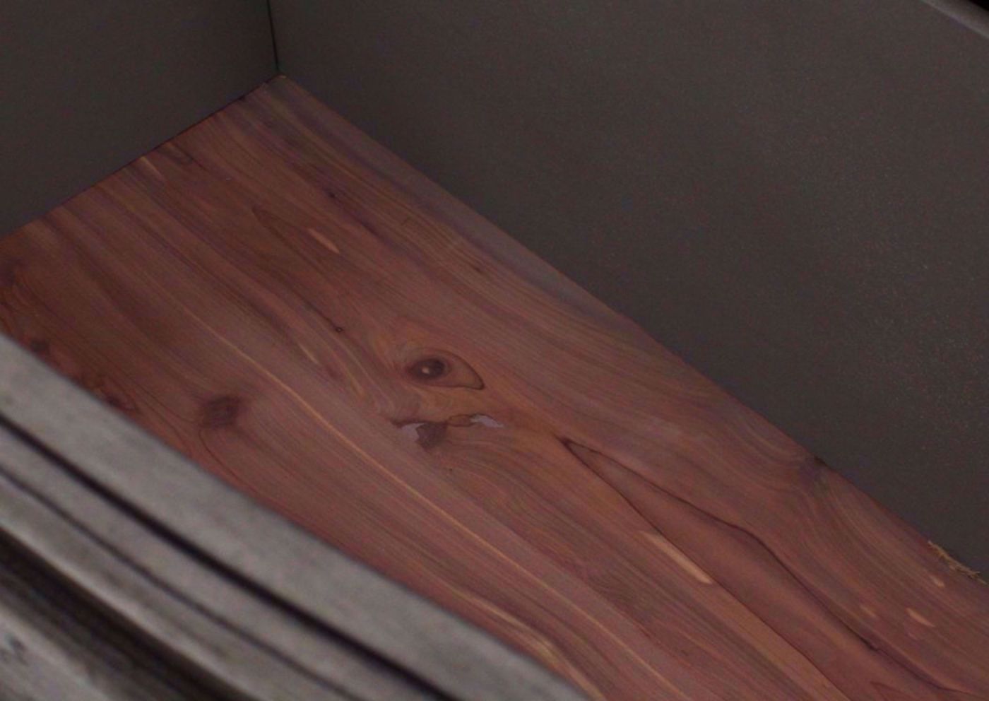 Gray Pecan Lake Way Chest of Drawers Showing the Cedar Lined Bottom Drawer Interior | Home Furniture Plus Mattress