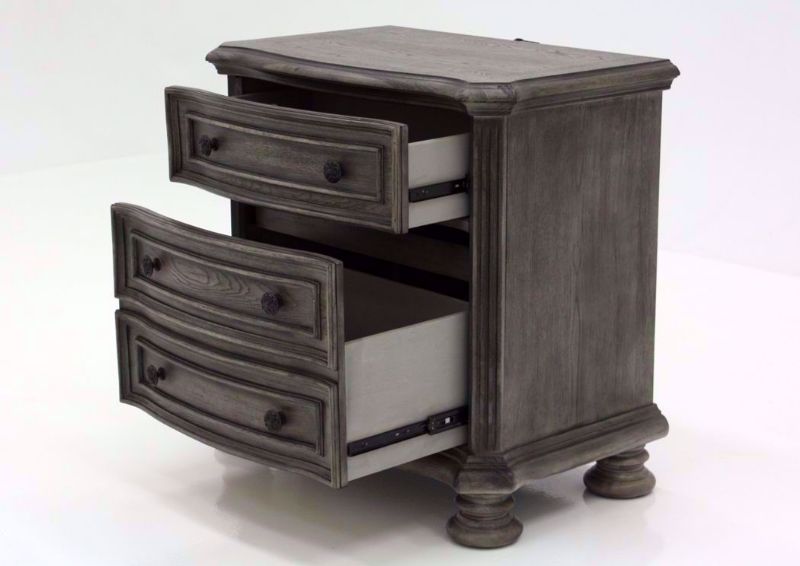 Gray Pecan Lake Way Nightstand at an Angle With the Drawers Open | Home Furniture Plus Mattress
