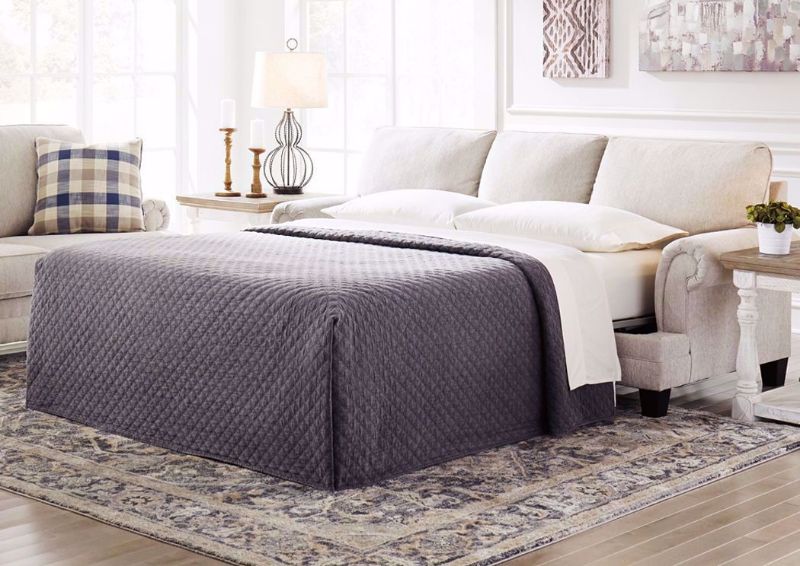 Off White Meggett Queen Sofa Sleeper by Ashley Furniture in a Room Setting | Home Furniture Plus Mattress