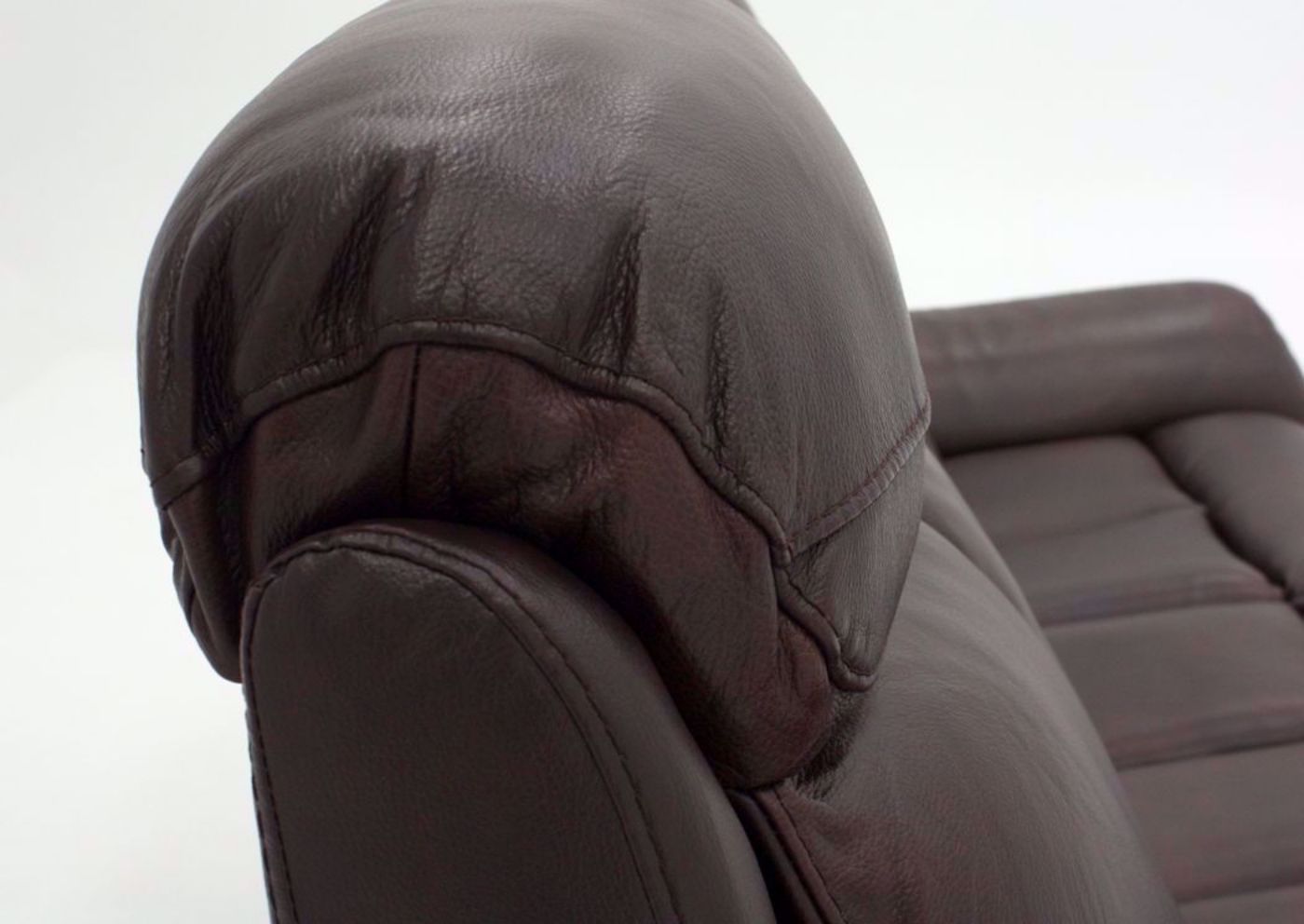 Brown Alpha POWER Reclining Sofa Showing the Adjustable Headrest | Home Furniture Plus Mattress