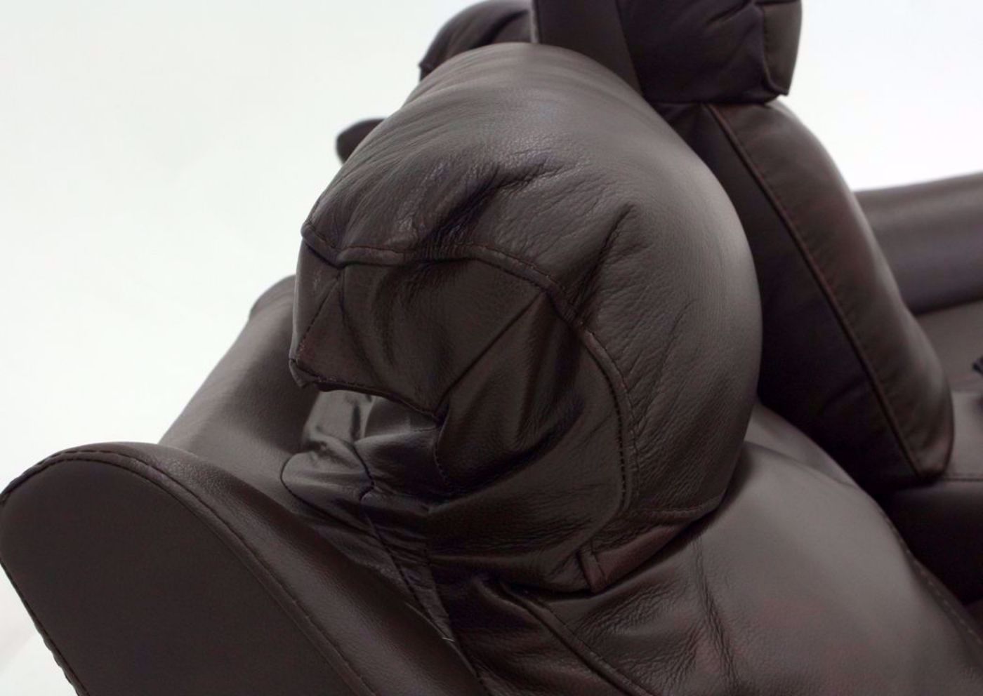 Brown Alpha POWER Glider Reclining Loveseat Showing the Adjustable Headrest | Home Furniture Plus Mattress