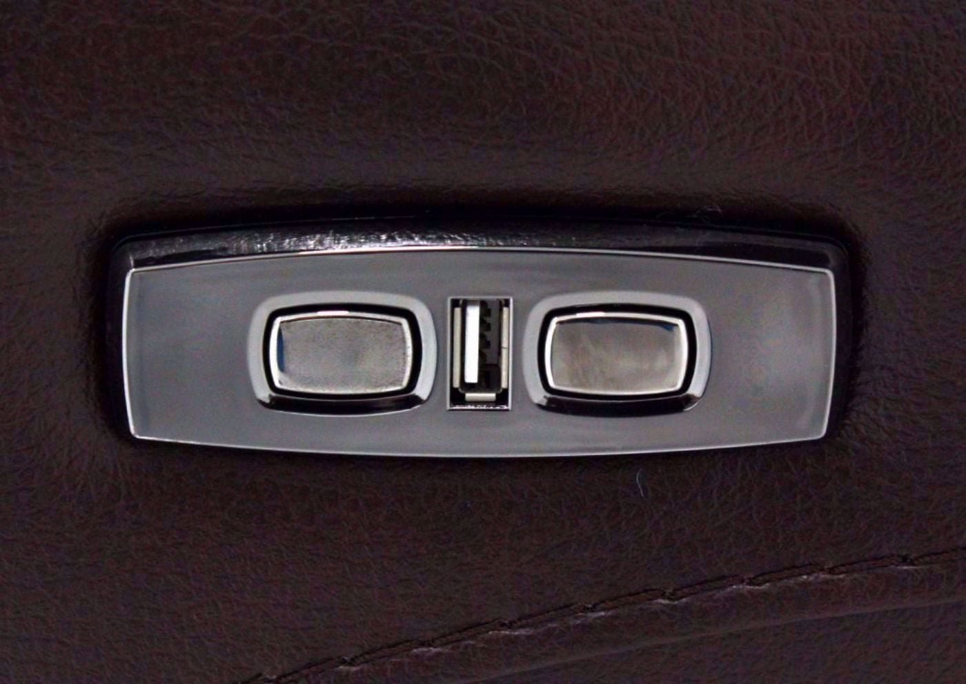 Brown Alpha POWER Glider Reclining Loveseat Showing the Power Buttons and USB Port | Home Furniture Plus Mattress