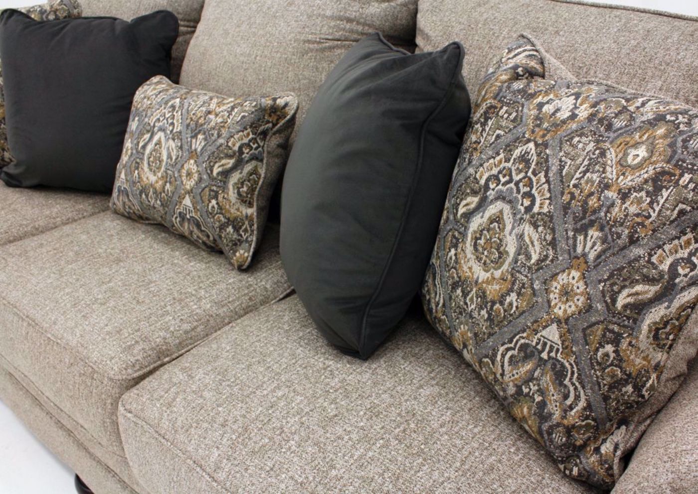 Tan Kananwood Sleeper Sofa by Ashley Furniture Showing the Accent Pillows | Home Furniture Plus Mattress