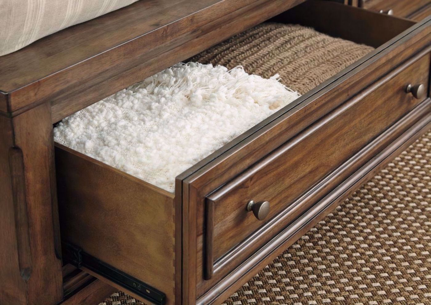 Tobacco Brown Flynnter Queen Size Storage Bed by Ashley Furniture Showing the Storage Footboard Drawers Open | Home Furniture Plus Bedding