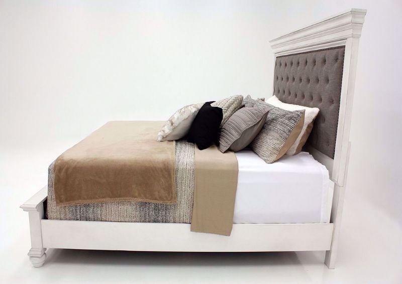 Distressed White Kanwyn Upholstered King Size Bed by Ashley Showing the Side View | Home Furniture Plus Mattress