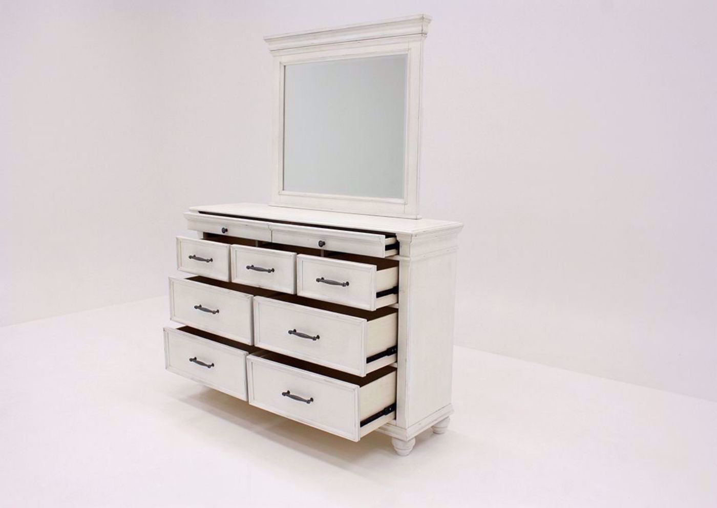 Angled View With the Drawers Open on the White Kanwyn Dresser with Mirror by Ashley Furniture | Home Furniture Plus Bedding