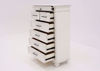 Distressed White Kanwyn Chest of Drawers by Ashley at an Angle with the Drawers Open | Home Furniture Plus Mattress
