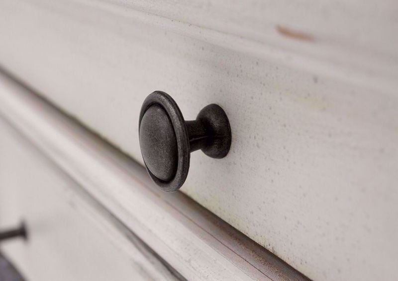 Distressed White Kanwyn Chest of Drawers by Ashley Showing the Drawer Knob | Home Furniture Plus Mattress