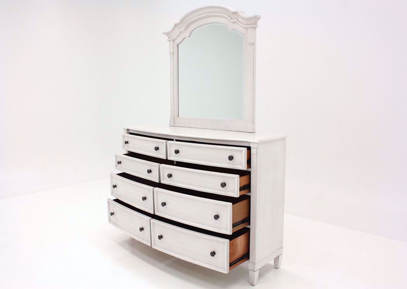 White Mallory Dresser with Mirror by Standard at an Angle With the Drawers Open | Home Furniture Plus Mattress