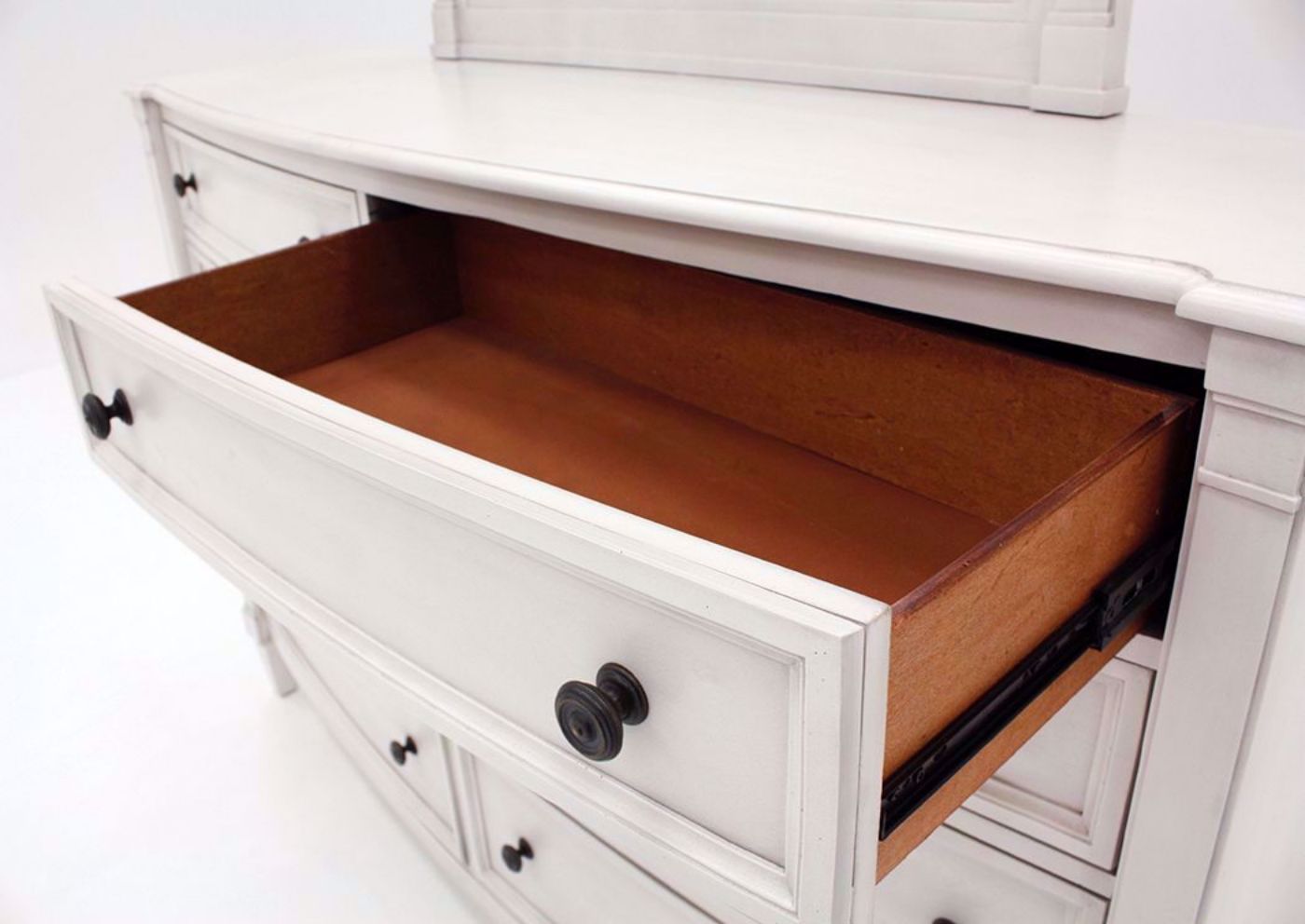 White Mallory Dresser with Mirror by Standard Showing the Drawer Interior | Home Furniture Plus Mattress