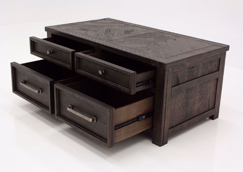Brown Hillcott Storage Coffee Table by Ashley at an Angle With the Drawers Open | Home Furniture Plus Mattress